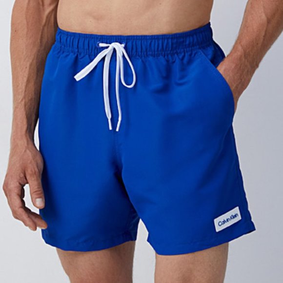 Calvin Klein CK  Logo Badge Solid Swim Trunk Blue - Picture 1 of 4
